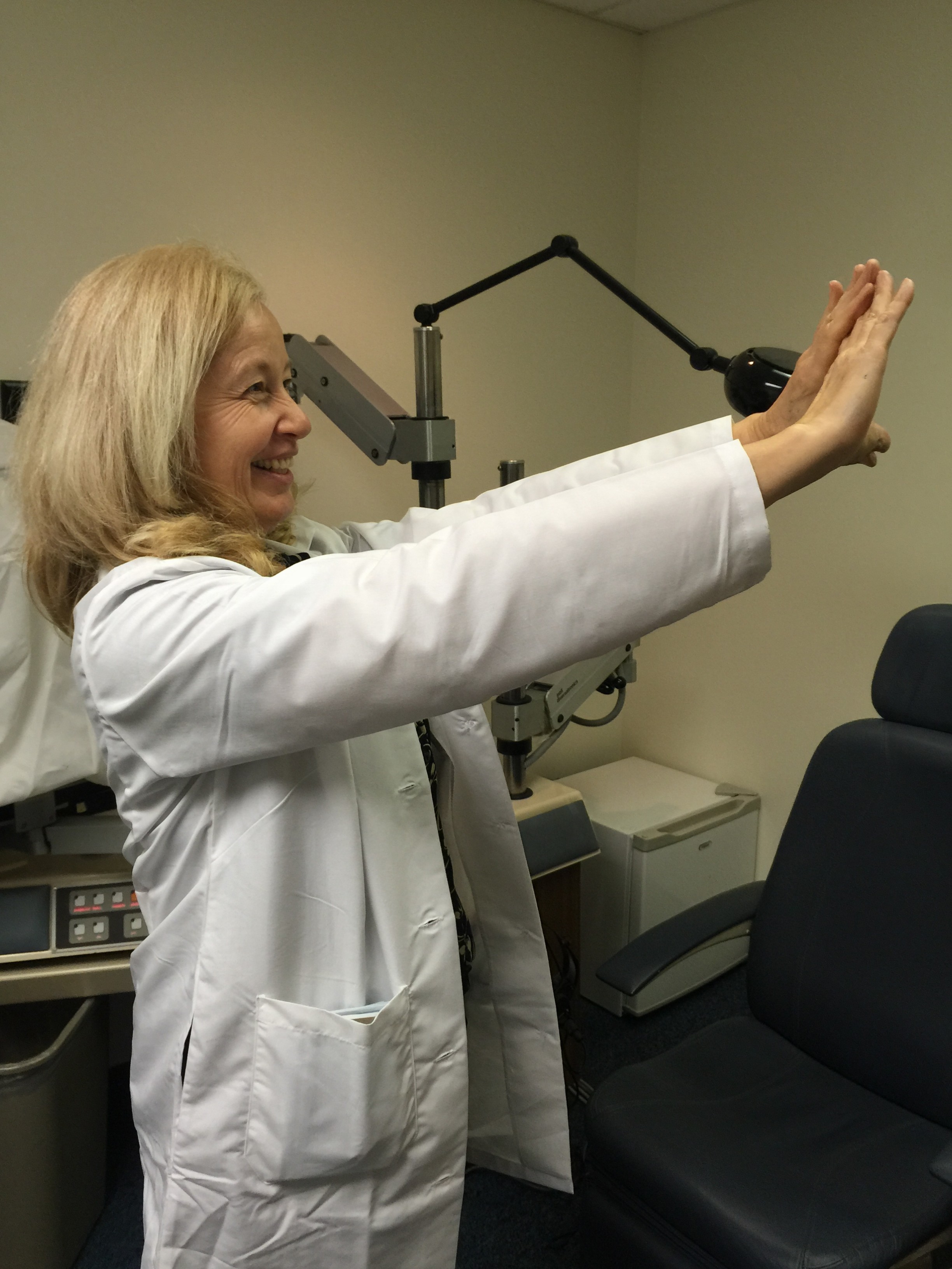 Extend both of your hands in front of your body and form a small triangle with your hands. Courtesy of Dr. Anne Sumers.