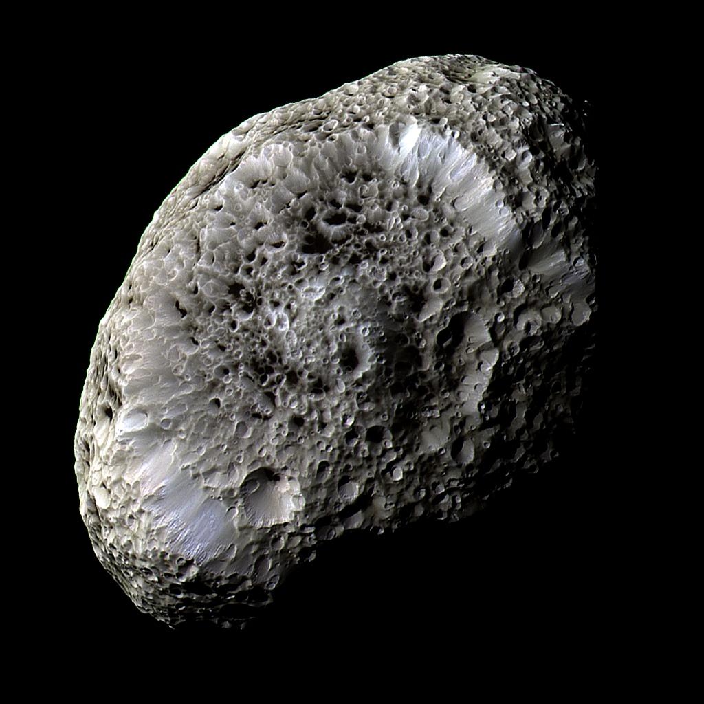 This stunning false-color view of Saturn's moon Hyperion reveals crisp details across the strange, tumbling moon's surface. Differences in color could represent differences in the composition of surface materials. Credit: NASA/JPL/Space Science Institute
