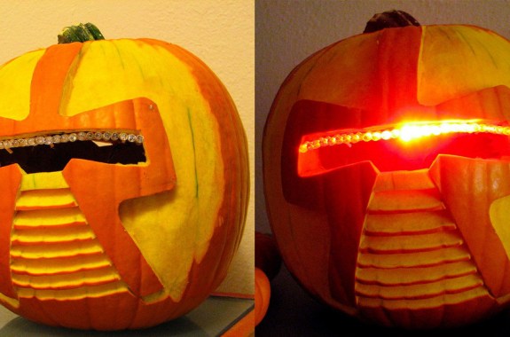 two carved pumpkins side by side, on the right it shows the pumpkin lit up with a laser