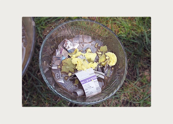 Shredded newspaper and an egg yolk are added to the mud.