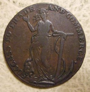 close-up of token featuring a woman