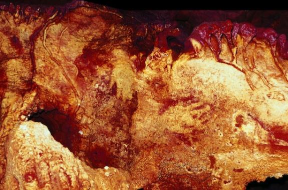 color enhanced image showing three different hand print stencils