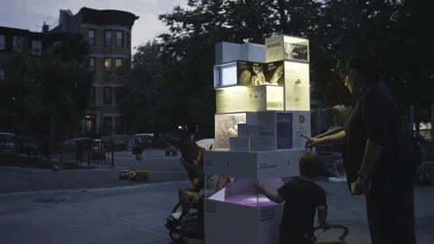 woman and child looking at small museum