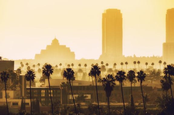 Skyline during an exceptionally warm day, with heat radiating off the ground and a yellowish tint to the sky