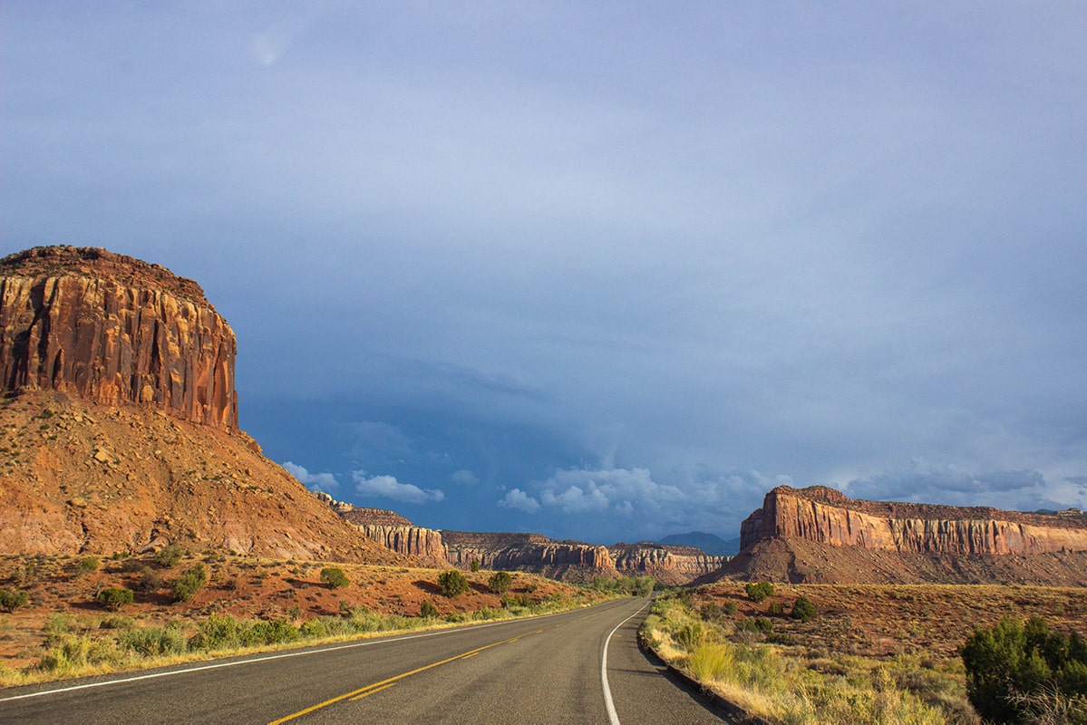A road passes through two mesas
