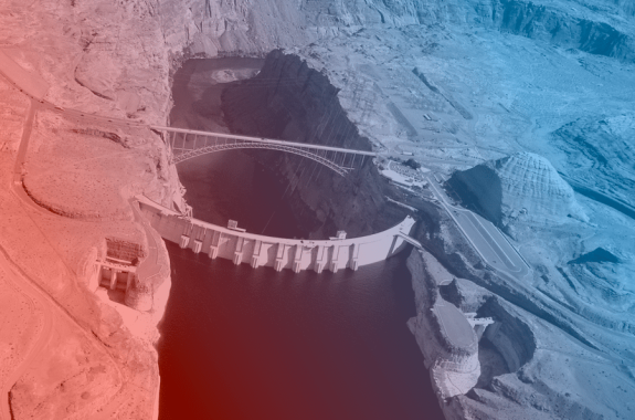 a dam from above, on one side the water is much lower than the other