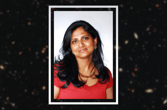 headshot of woman against blurred out star background