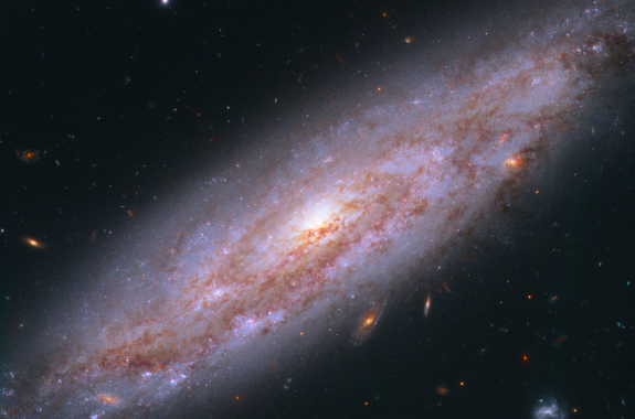 a bright oval, swirling galaxy