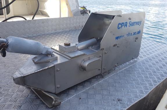 a metallic device with a hook attached that says 'cpr survey, www.mba.ac.uk' on the side