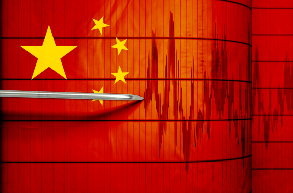 an image of a seismograph machine printing out a seismograph on a chinese flag