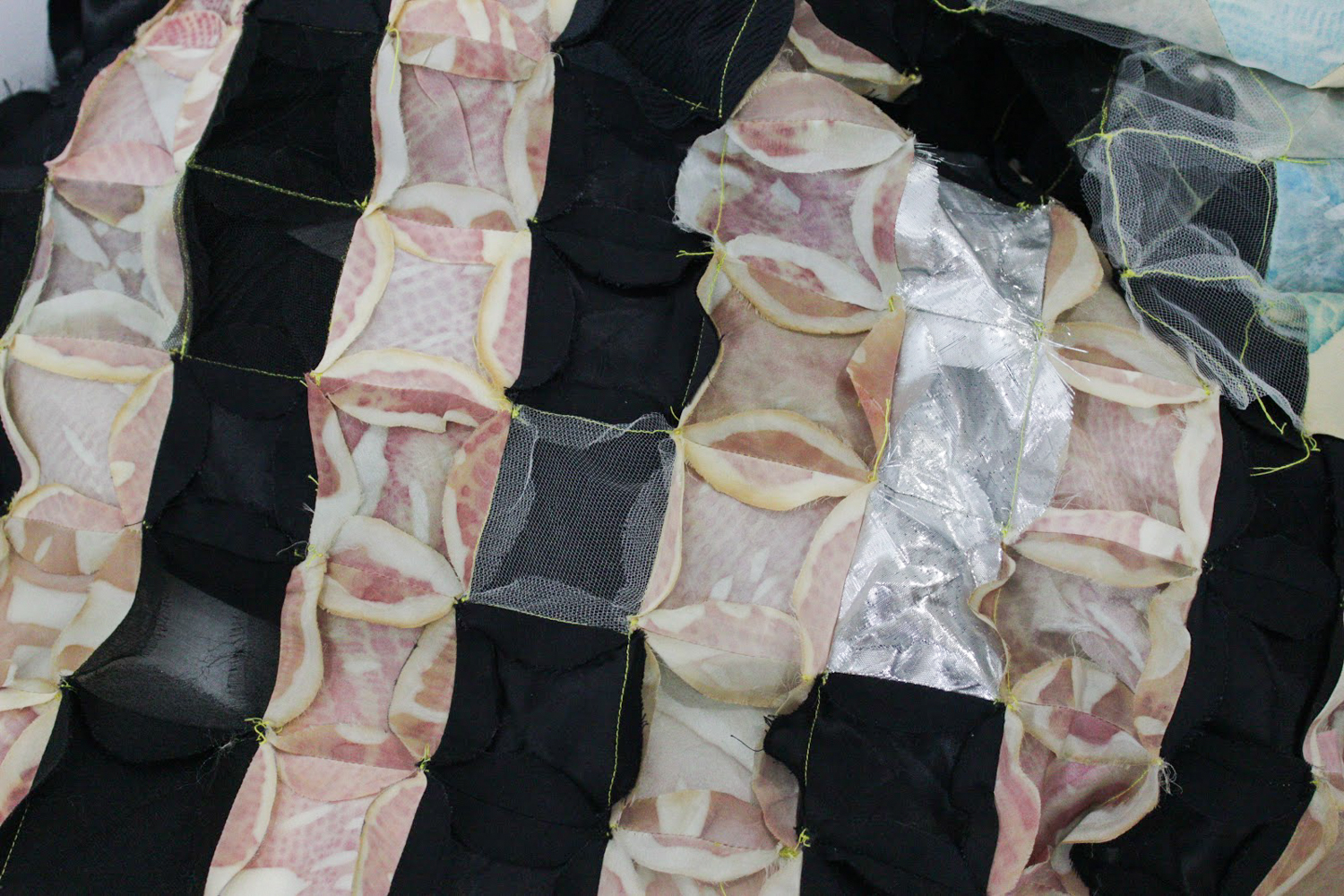 Fabric with black and pink patches