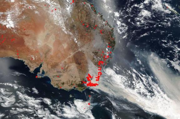 a satellite image taken over australia shows the smoke from the fires