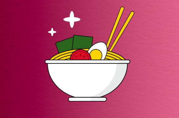 ramen bowl with tomato, egg, and kelp with chopsticks sticking out of it