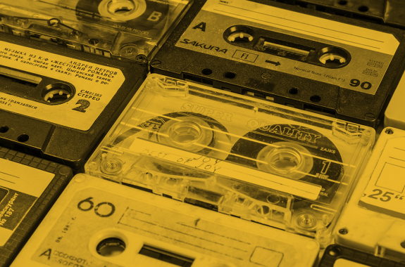 yellow filtered image of rows of tapes