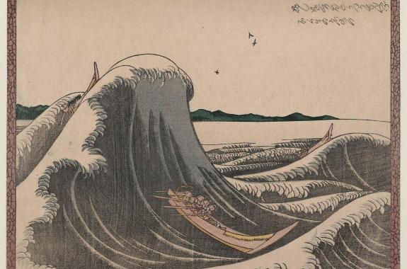 a japanese woodblock polychromatic print that looks faded. a small merchant boat with rowers face a towering gray wave on a rocky sea. several other boats can be seen in the distance.
