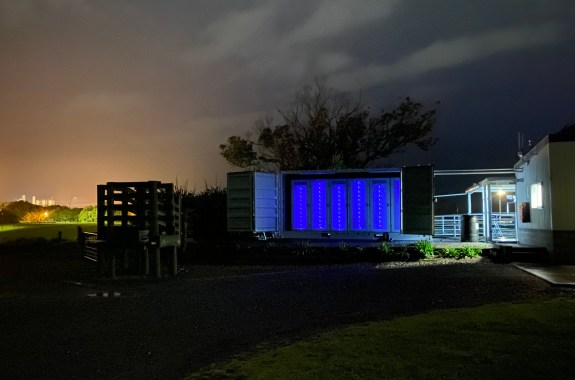 PolyJoule’s conductive polymer energy storage system illuminated at night.