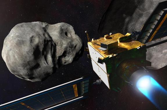 A small rectangular yellow spacecraft with a jet emitting blue flame flies toward a large grey asteroid.