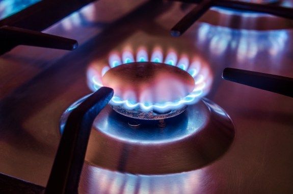 a gas burner turned on on a stove