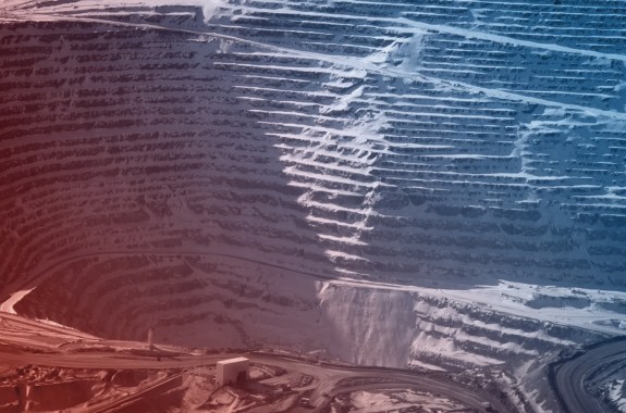 A huge mining quarry, powdered with snow.