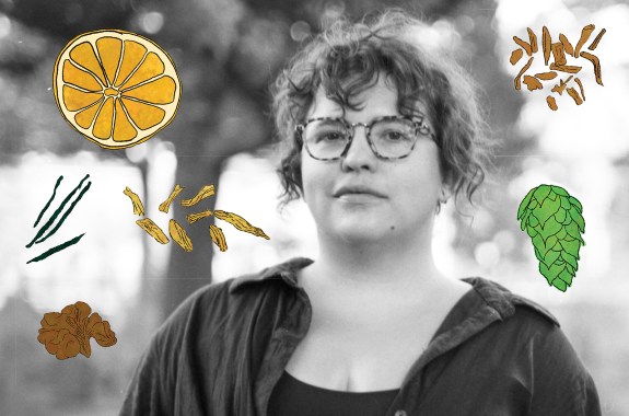 A person wearing glasses. Illustrations of citrus, nuts, and herbs surround them.