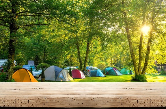 Camping tent in a camping in a forest by the river.Camp site in the forest, campground at National Park, camping in mountains, travel concept,