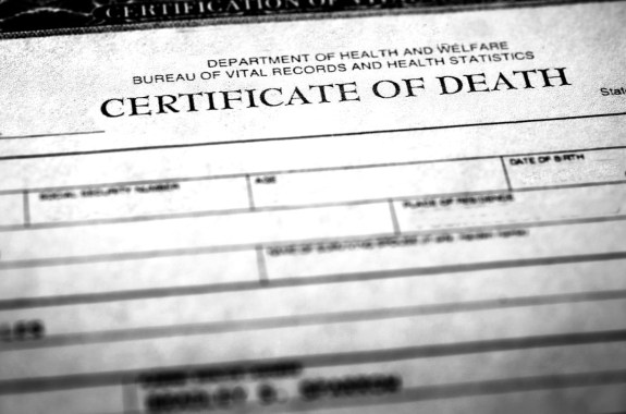 Closeup of a death certificate symbolizing person who passed away