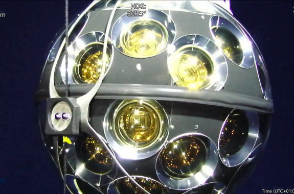 A ball of metal with various circular sensors all over its surface