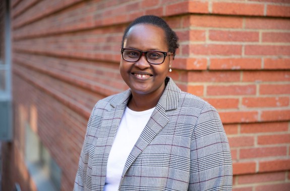 A woman smiling at the camera.