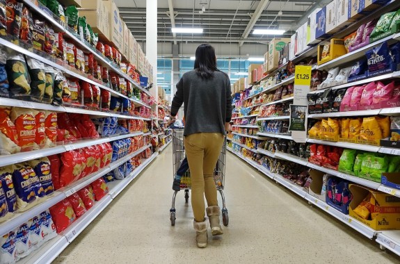 Shoppers browse an aisle in a Tesco supermarket on April 4, 2019 in London, UK. Britain's Tesco is the world's 3rd largest supermarket retailer after America's Walmart and France's Carrefour.